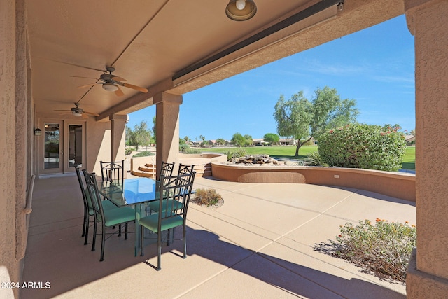 view of patio / terrace featuring ceiling fan