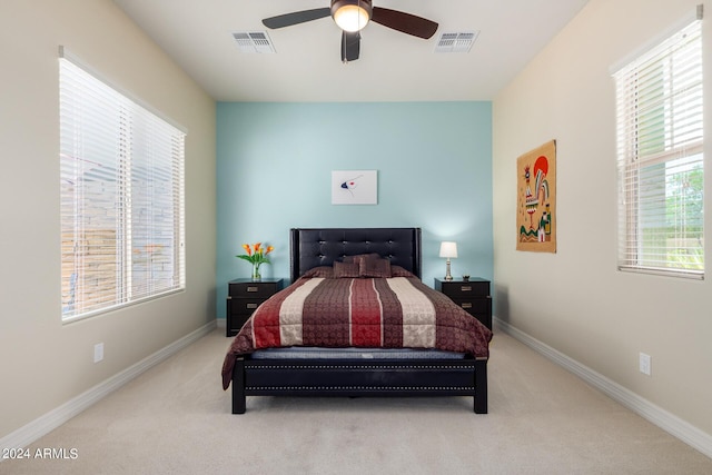 carpeted bedroom featuring ceiling fan