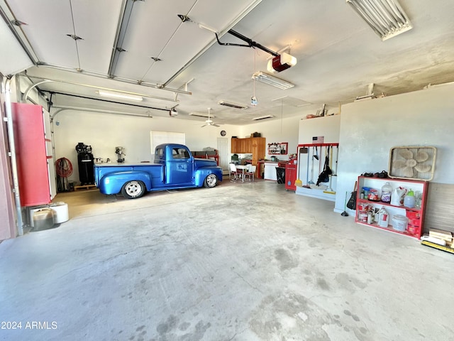 garage featuring a garage door opener