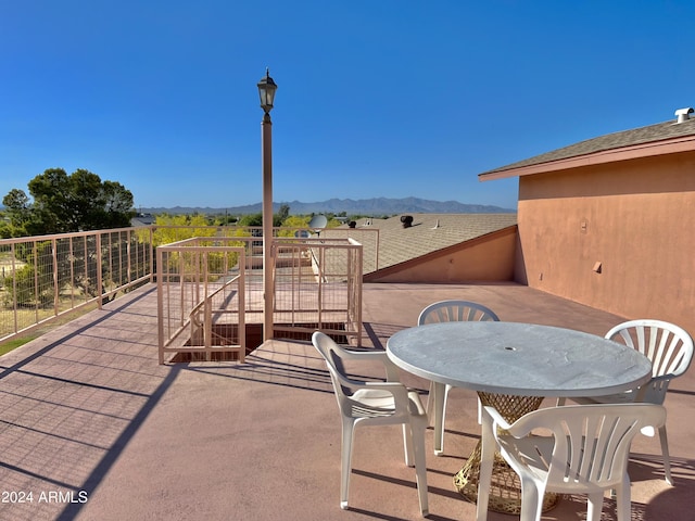 view of patio featuring a mountain view