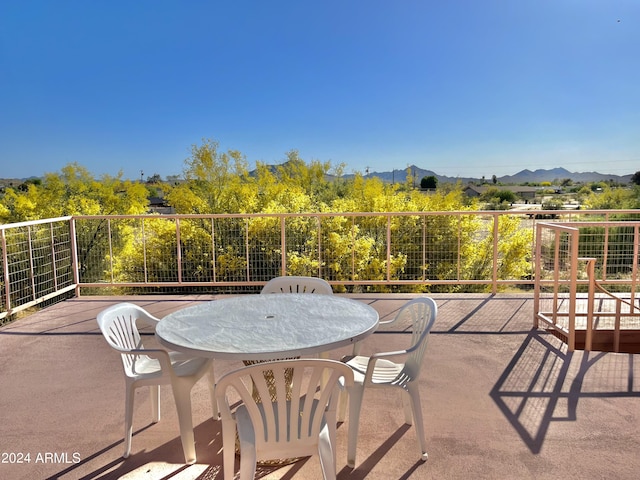 view of patio with a mountain view