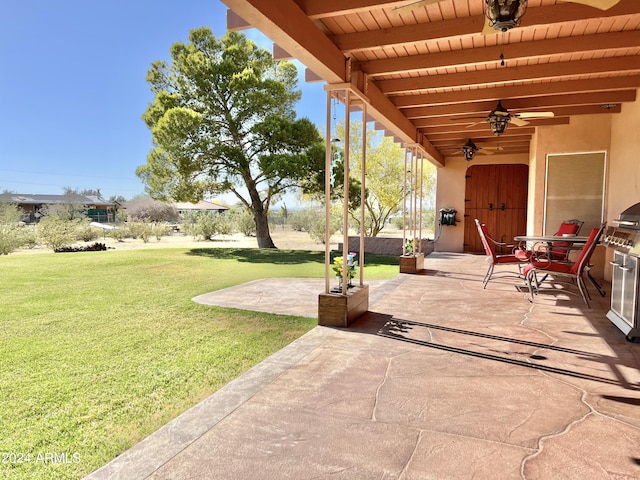 view of patio featuring ceiling fan