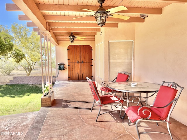 view of patio / terrace featuring ceiling fan