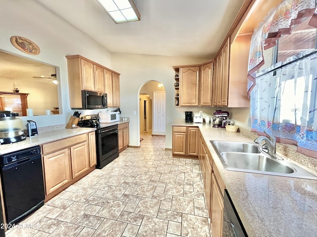 kitchen with sink, light brown cabinets, ceiling fan, and black appliances