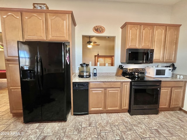 kitchen with ceiling fan, light brown cabinetry, and black appliances