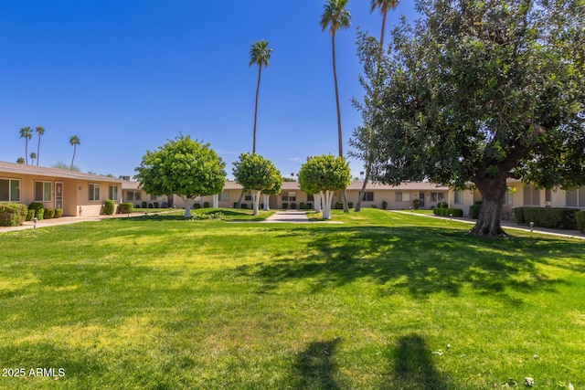 surrounding community with a lawn