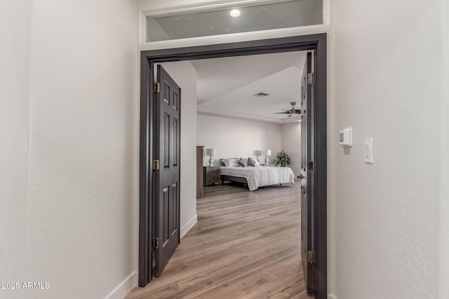 hall featuring light hardwood / wood-style floors