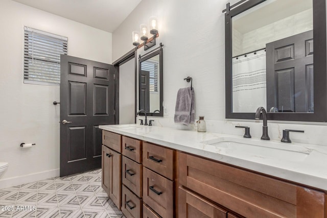 bathroom with vanity, walk in shower, and toilet