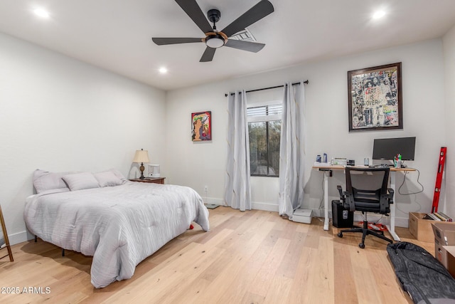 bedroom featuring ceiling fan and light hardwood / wood-style floors