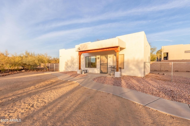 view of front of home with a patio