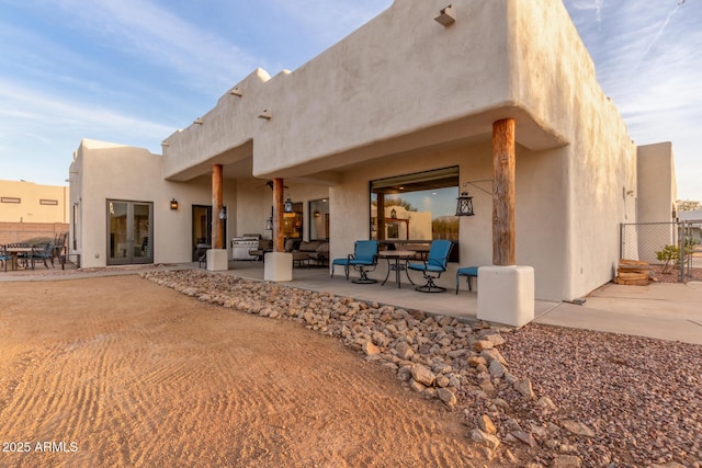 back of house featuring a patio area