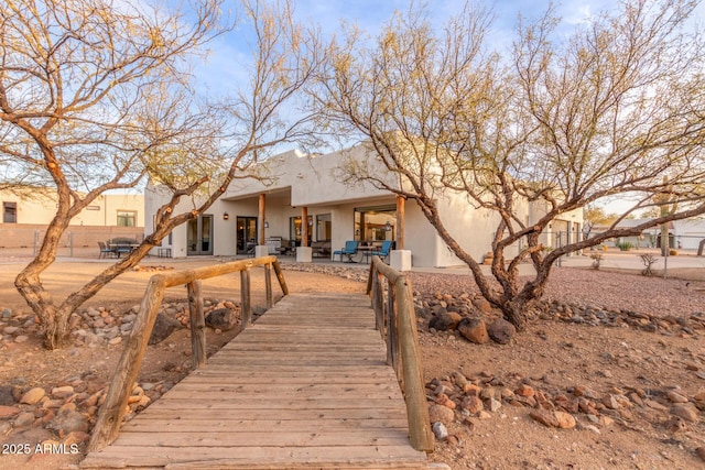 back of property with a patio area