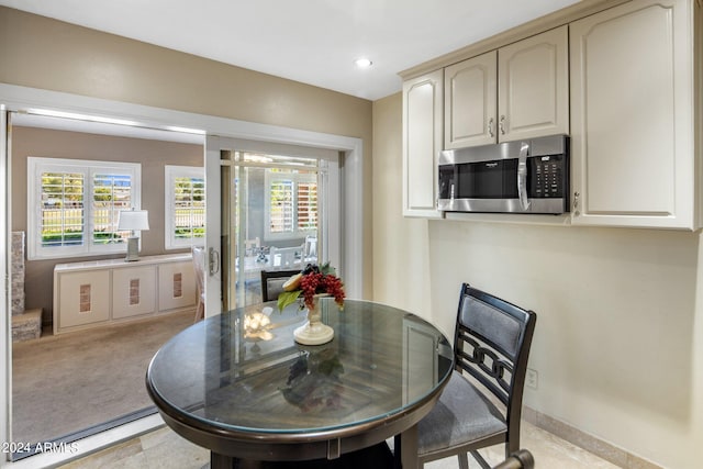 view of carpeted dining space