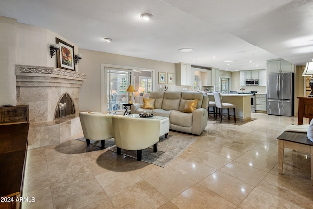 living room featuring a fireplace