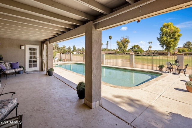 view of swimming pool featuring a patio