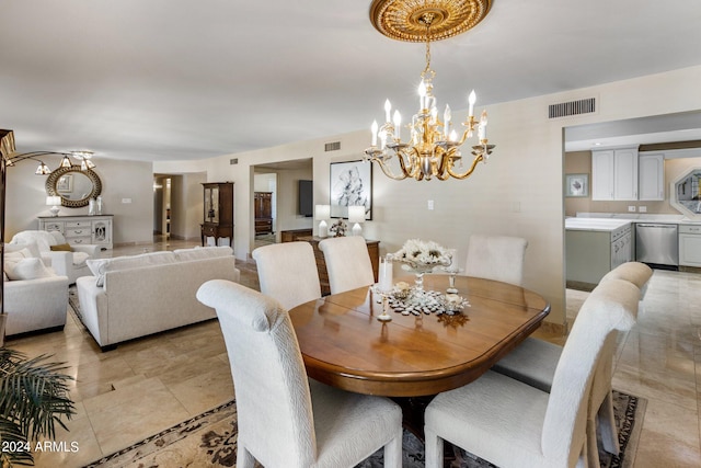 tiled dining room featuring a notable chandelier