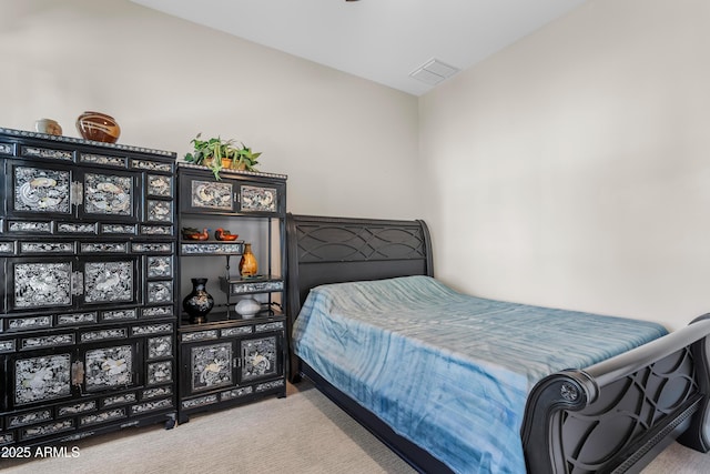 bedroom featuring carpet and visible vents