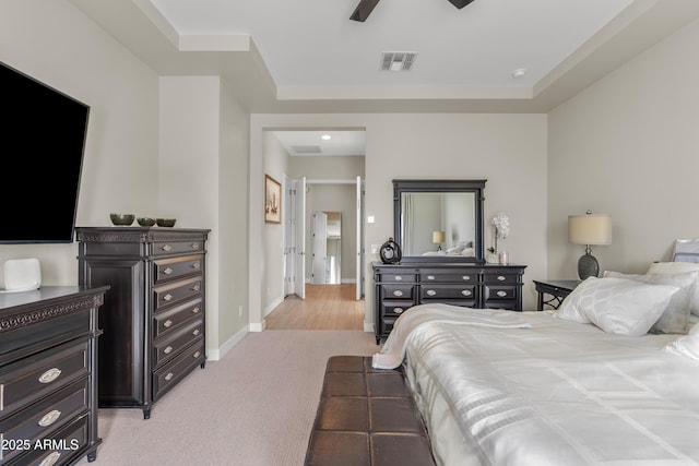 bedroom with a ceiling fan, baseboards, and visible vents