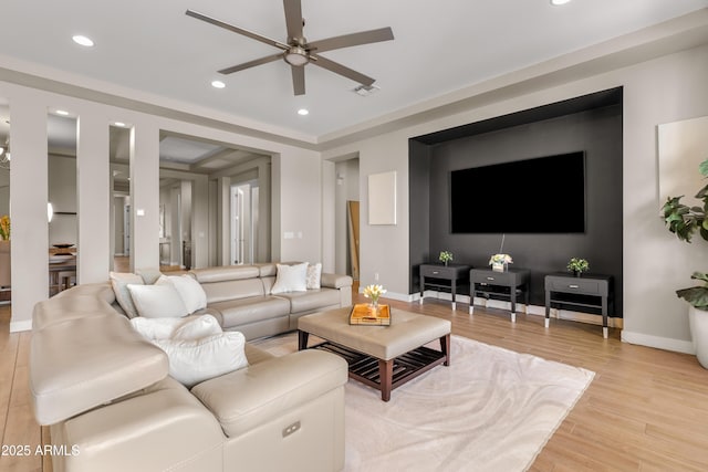 living area with recessed lighting, light wood-type flooring, baseboards, and ceiling fan