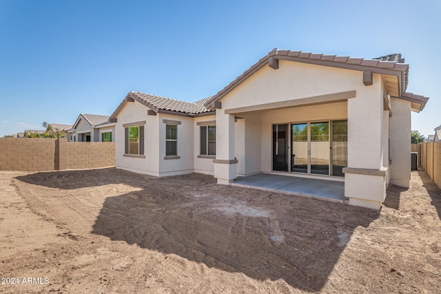 rear view of property with a patio