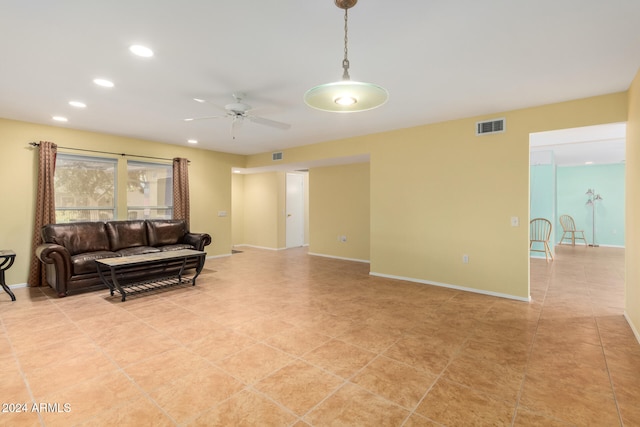 living room featuring ceiling fan