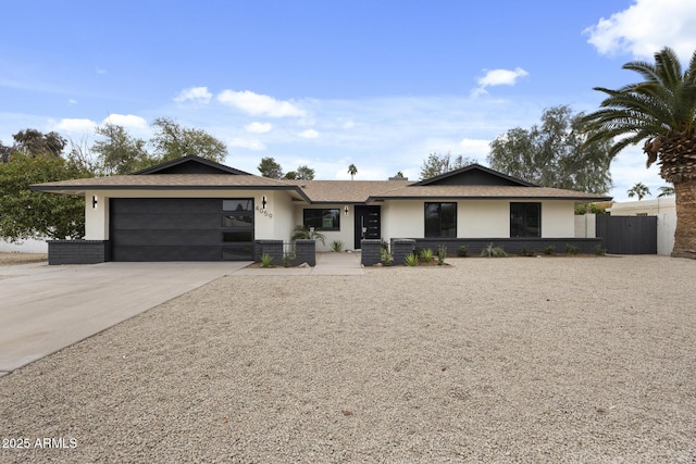 ranch-style house featuring a garage