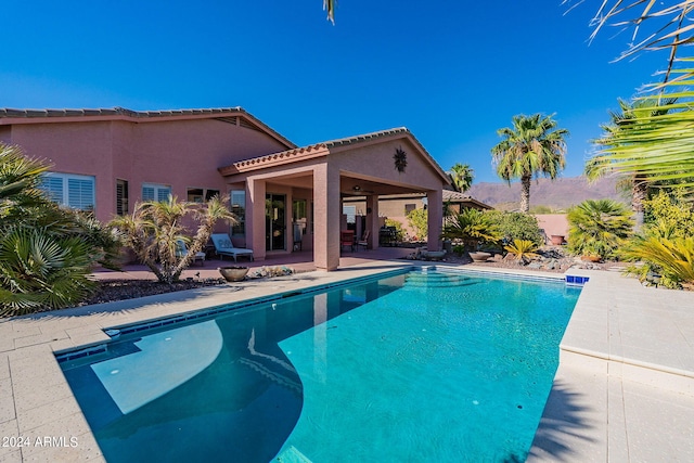 pool with a patio area