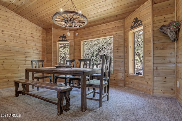 dining area featuring wood ceiling, wooden walls, lofted ceiling, and carpet