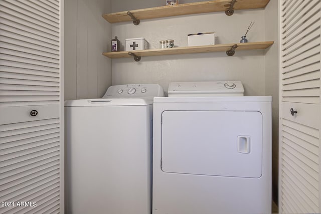 laundry area with washer and dryer