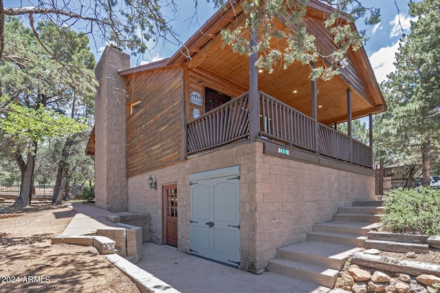 view of property exterior with a balcony