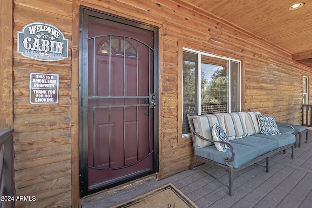 entrance to property with covered porch