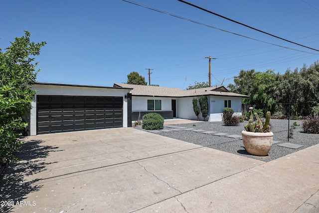 single story home with a garage