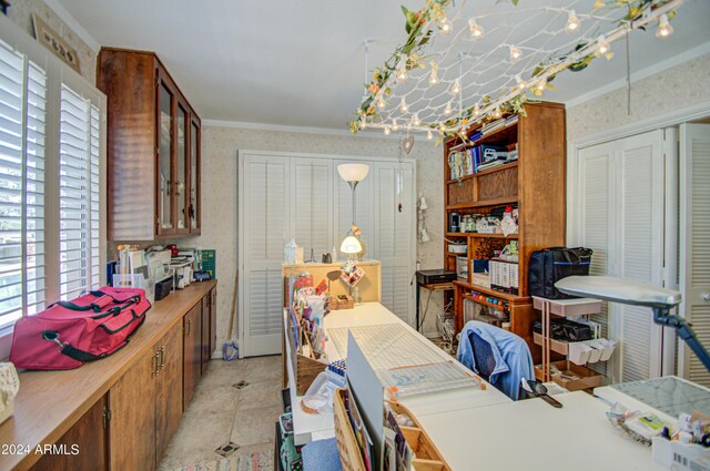 office with ornamental molding and a wealth of natural light