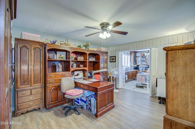 office space featuring light hardwood / wood-style floors and ceiling fan