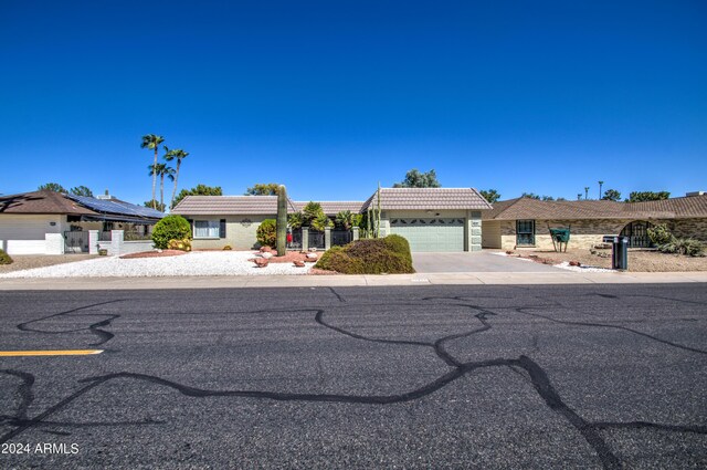 single story home featuring a garage