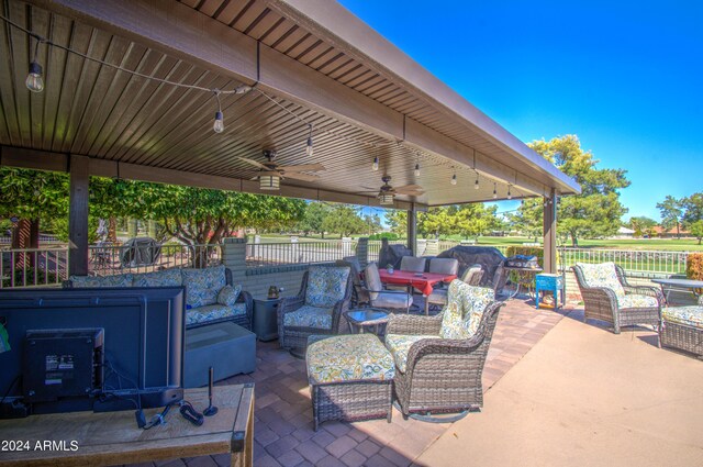 view of patio with an outdoor hangout area and ceiling fan