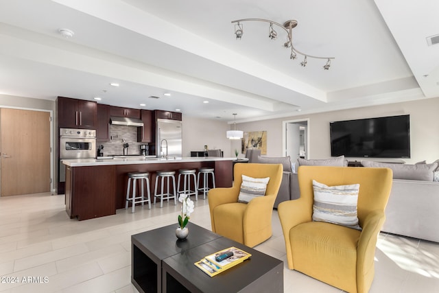 tiled living room with sink