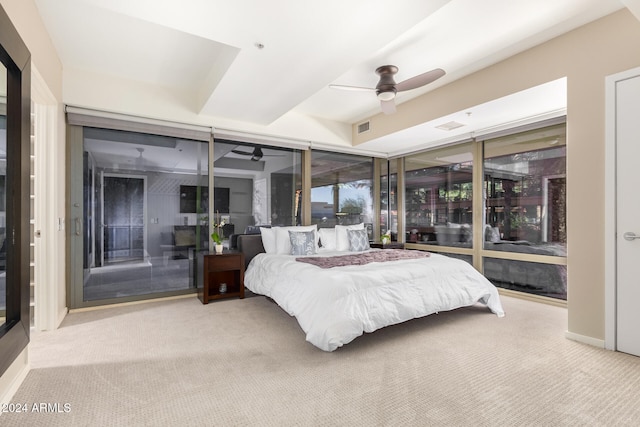 bedroom featuring carpet, ceiling fan, and access to outside