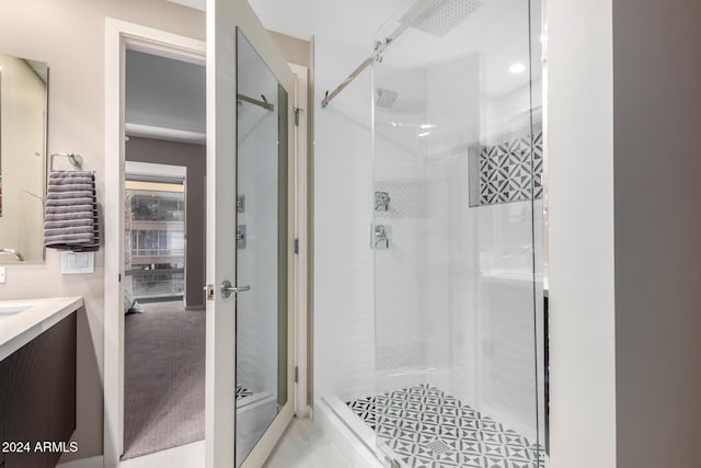 bathroom with vanity and walk in shower