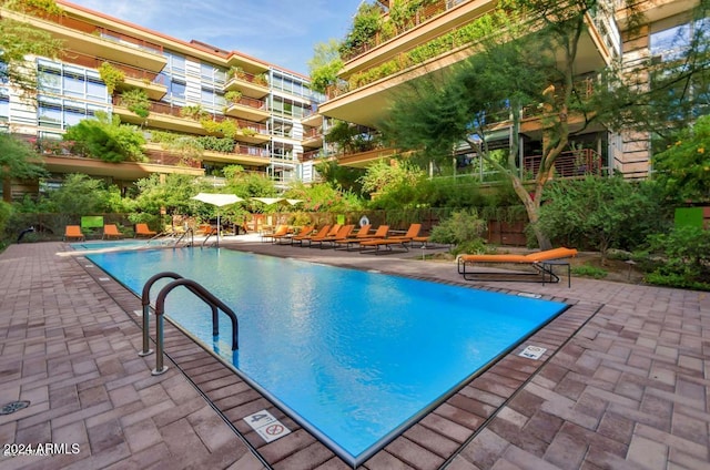 view of pool with a patio