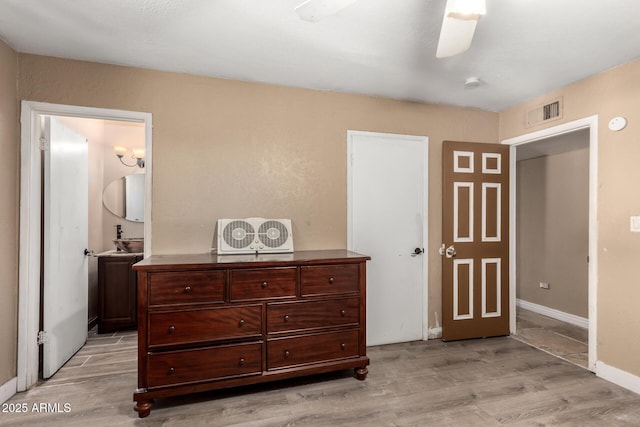 bedroom featuring light wood-type flooring