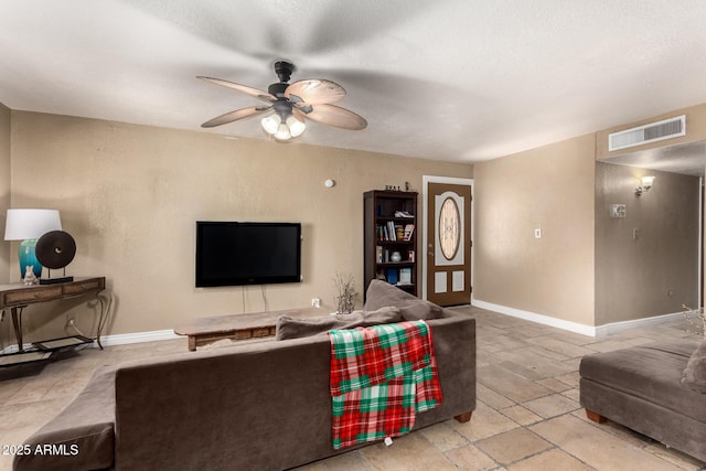 living room with ceiling fan