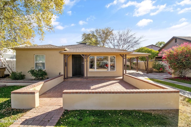 view of front of property with a patio area