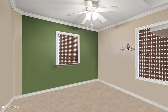 unfurnished room with ornamental molding and ceiling fan