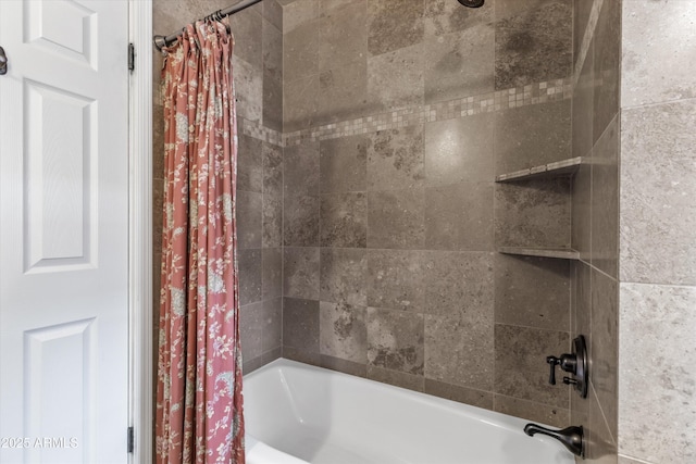 bathroom with shower / bath combo