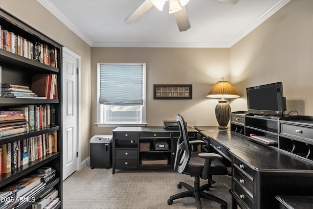 carpeted home office with ceiling fan and ornamental molding