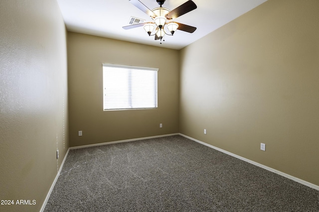 empty room featuring ceiling fan and carpet floors