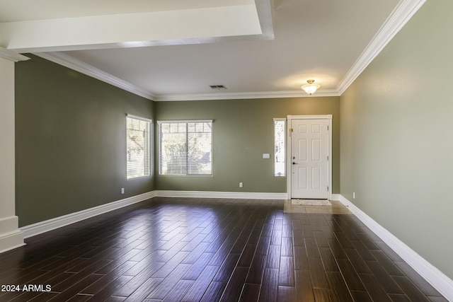 foyer with dark hardwood / wood-style flooring and crown molding