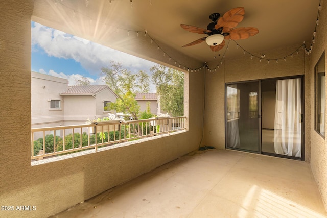 balcony with a ceiling fan