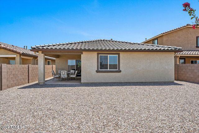 back of house featuring a patio area